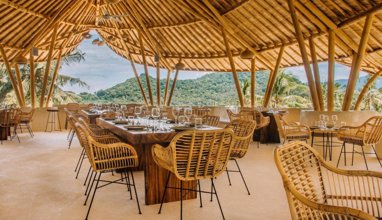 Neano Escape Manggis Exterior foto The restaurant at the resort
