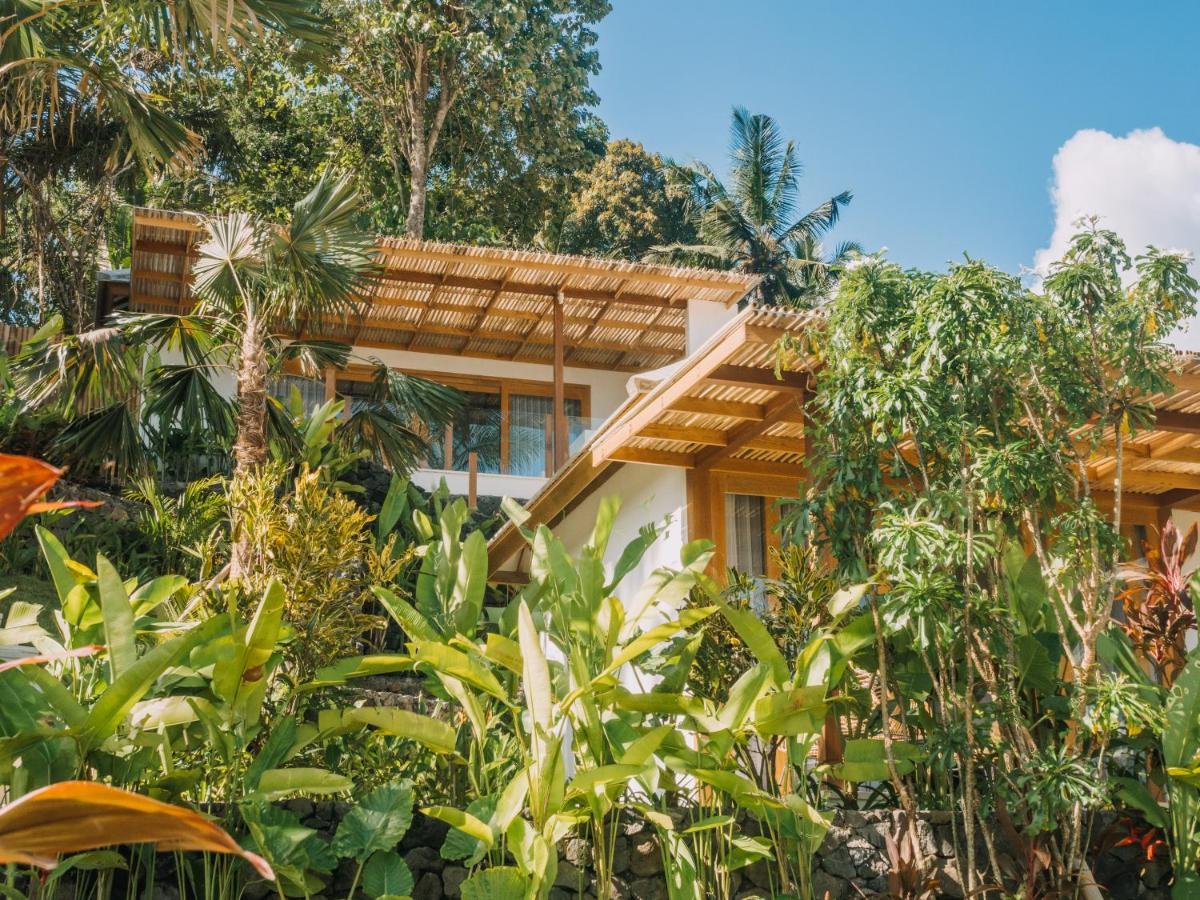 Neano Escape Manggis Exterior foto The resort's villas