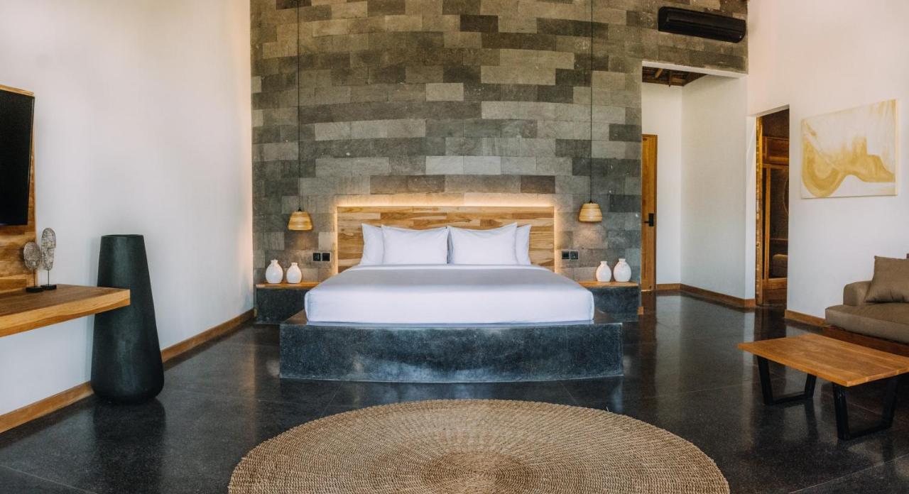 Neano Escape Manggis Exterior foto A bedroom at the hotel
