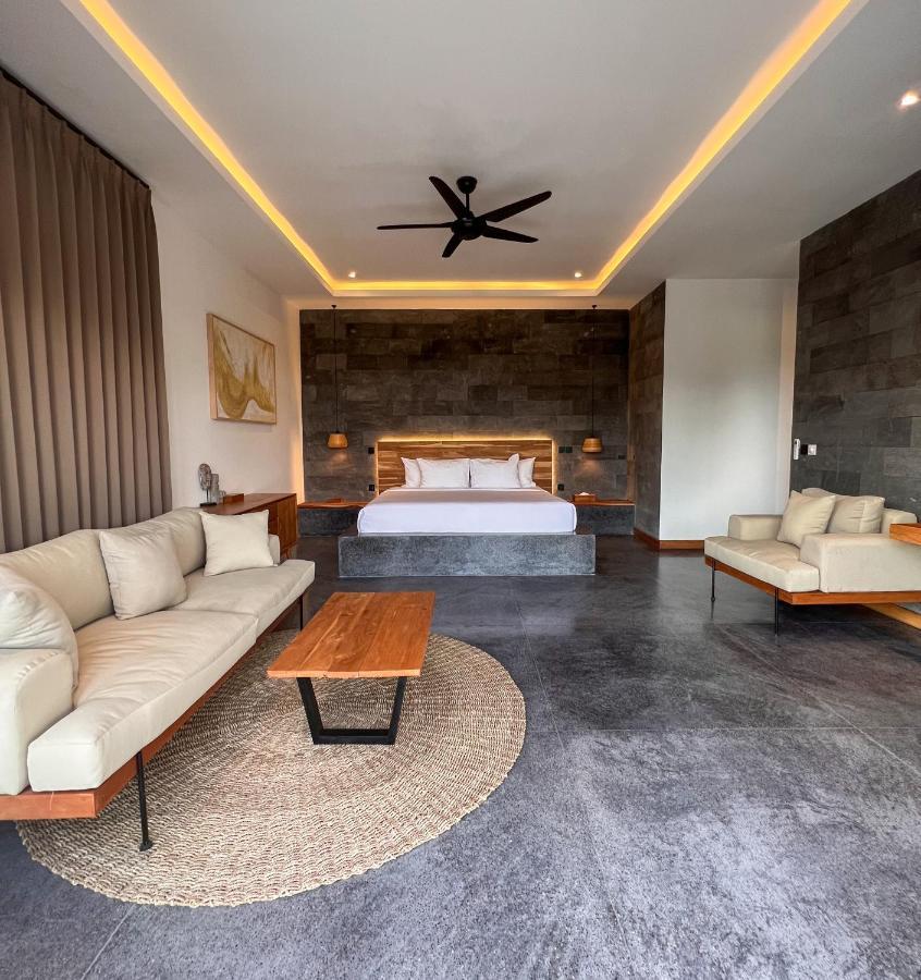 Neano Escape Manggis Exterior foto A bedroom at the resort