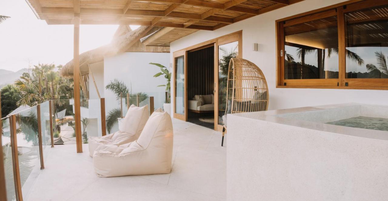 Neano Escape Manggis Exterior foto The interior of a villa at the resort